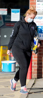 Josie Gibson in black tracksuit and trainers