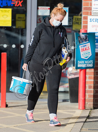 Josie Gibson in black tracksuit and trainers