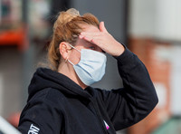 Josie Gibson in black tracksuit and trainers