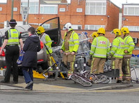 Car flattens bike stand and mounts row of trolleys in accident in Tewkesbury, Gloucestershire