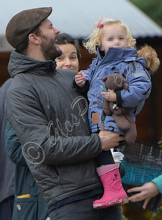 Jamie Doenan, Amelia Warner and daughter Dulcie pictured at Farmers Market