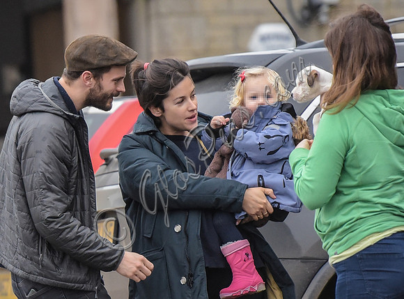 Jamie Dornan, Amelia Warner and daughter Dulcie fuss white puppy