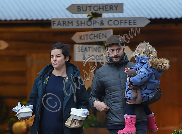 Jamie Doenan, Amelia Warner and daughter Dulcie pictured at Farmers Market