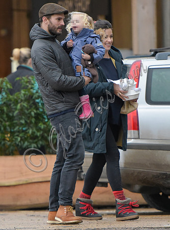 Jamie Doenan, Amelia Warner and daughter Dulcie pictured at Farmers Market