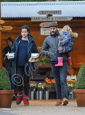 Jamie Doenan, Amelia Warner and daughter Dulcie pictured at Farmers Market