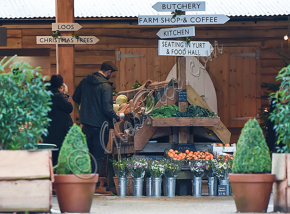 Jamie Dornan selecting vegetables at Farmers Market
