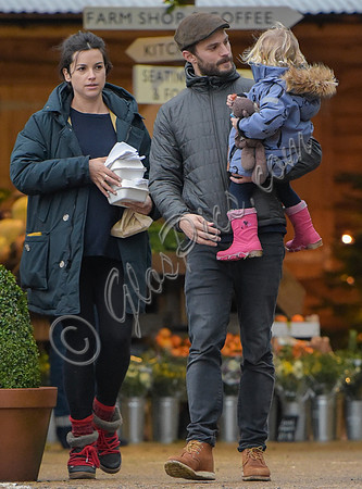 Jamie Doenan, Amelia Warner and daughter Dulcie pictured at Farmers Market