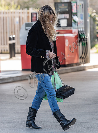 Kate Moss out and about dressed casually with  face-covering