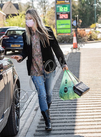 Kate Moss out and about dressed casually with  face-covering