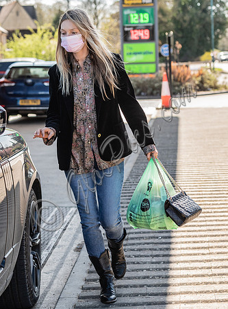 Kate Moss out and about dressed casually with  face-covering