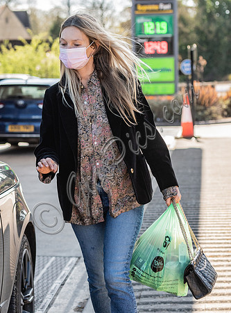 Kate Moss out and about dressed casually with  face-covering