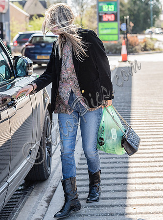 Kate Moss out and about dressed casually with  face-covering