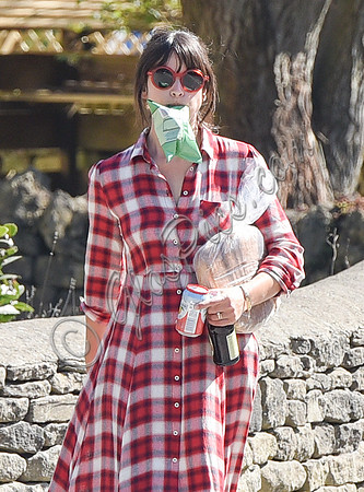 Amelia Warner wearing red and white check dress