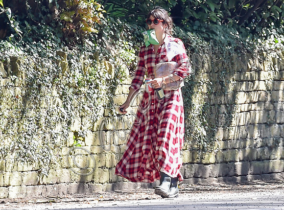 Amelia Warner wearing red and white check dress