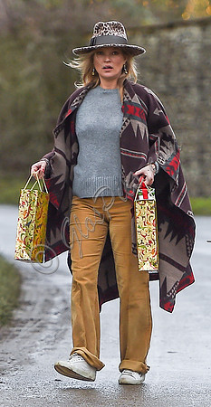 Kate Moss delivering festive gifts