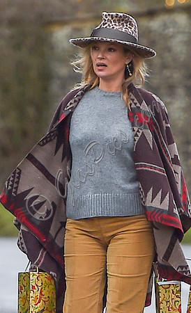 Kate Moss delivering festive gifts