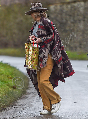 Kate Moss delivering festive gifts