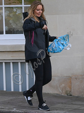 Carol Vorderman wearing black skinny top and leggings