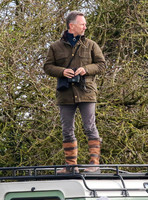 Red Bull team principal wearing country jacket and long boots at Point to point races