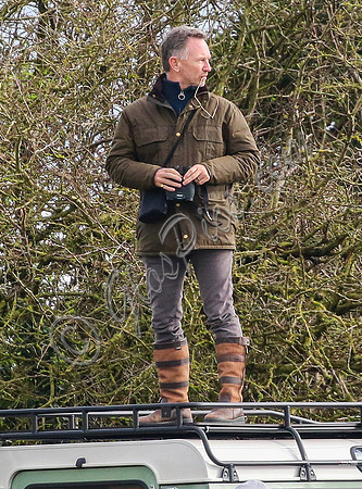 Red Bull team principal wearing country jacket and long boots at Point to point races