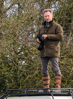 Red Bull team principal wearing country jacket and long boots at Point to point races