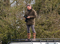 Red Bull team principal wearing country jacket and long boots at Point to point races