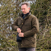 Red Bull team principal wearing country jacket and long boots at Point to point races