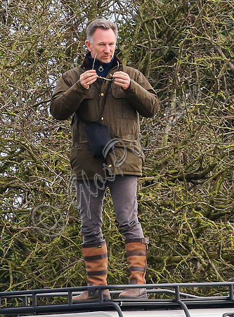 Red Bull team principal wearing country jacket and long boots at Point to point races