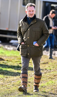 Red Bull team principal wearing country jacket and long boots at Point to point races