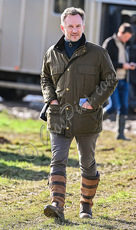 Red Bull team principal wearing country jacket and long boots at Point to point races