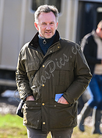 Red Bull team principal wearing country jacket and long boots at Point to point races