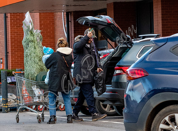 Sophie Rundle, Matt Stokoe with son buying Christmas tree