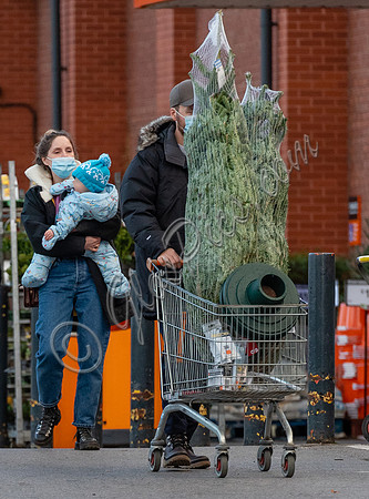 Sophie Rundle, Matt Stokoe with son buying Christmas tree