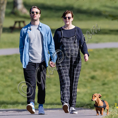 Pregnant Alexandra Roach in dungarees with husband Jack Scales