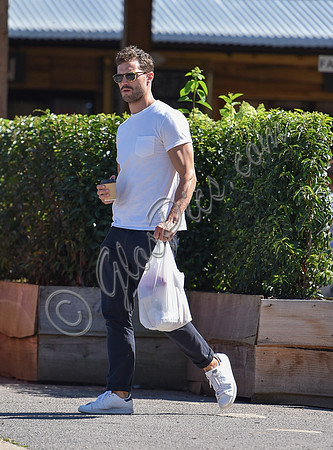 Jamie Dornan in white T shirt and Jeans