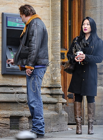 Nicolas Cage and Alice Kim at  cash machine