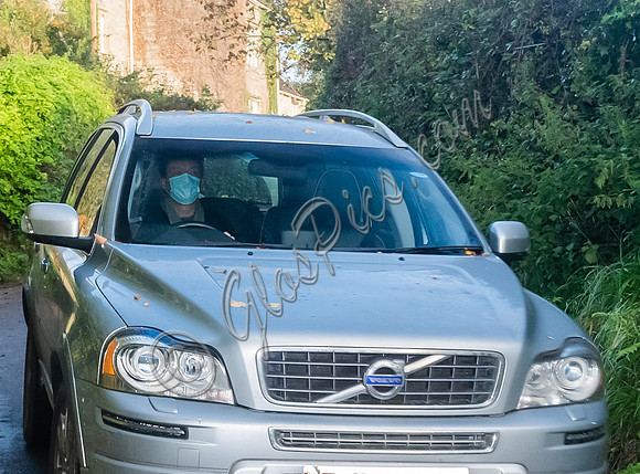 Dominic West car shot (wearing face covering)