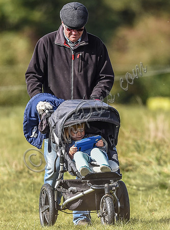 Mia Tindall in buggy with iPad