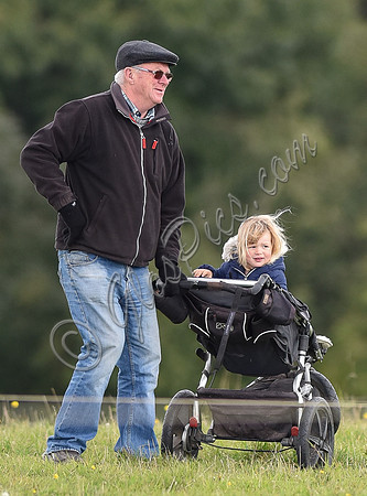 mischievous Mia Tindall plays with elderly family friend