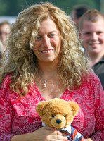Sara, Countess Bathurst clutching a teddy bear