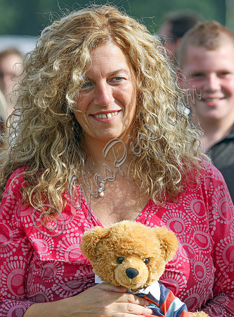 Sara, Countess Bathurst clutching a teddy bear