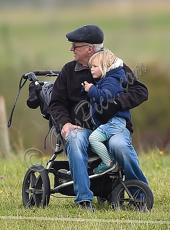 mischievous Mia Tindall plays with elderly family friend