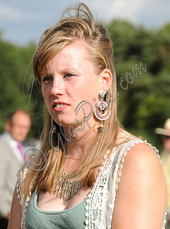 Rosie Bathurst wearing turquoise dangly earrings