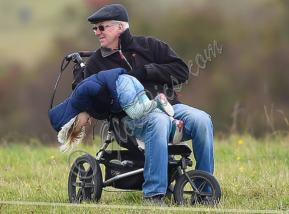 mischievous Mia Tindall plays with elderly family friend