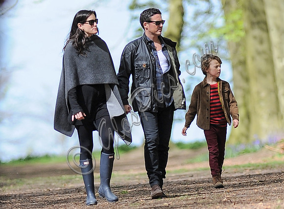 Liv Tyler and partner Dave Gardner hand in hand with Dave's son Gray