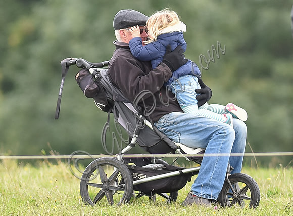 mischievous Mia Tindall plays with elderly family friend