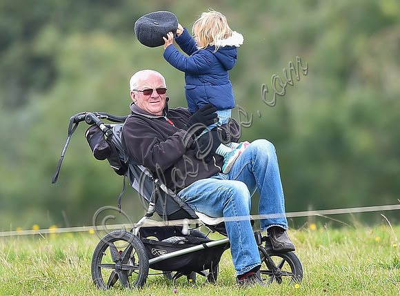 mischievous Mia Tindall plays with elderly family friend