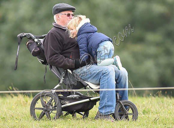 mischievous Mia Tindall plays with elderly family friend