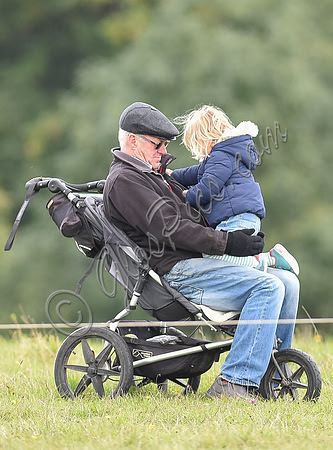 mischievous Mia Tindall plays with elderly family friend