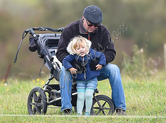 mischievous Mia Tindall plays with elderly family friend